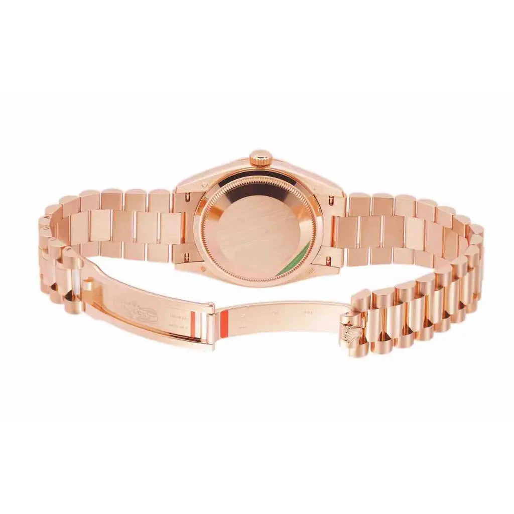 Day-date 36mm pink gold watch
Rolex